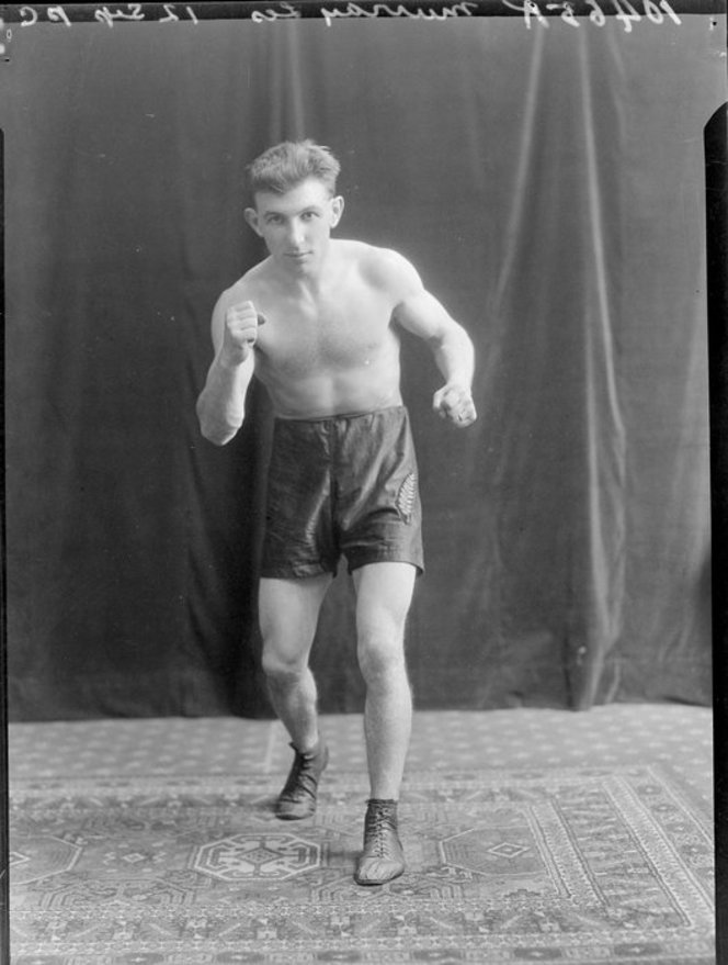 Mr Les Murray, boxer. Crown Studios Ltd :Negatives and prints. Ref: 1/2-204959-F. Alexander Turnbull Library, Wellington, New Zealand. http://natlib.govt.nz/records/22861462