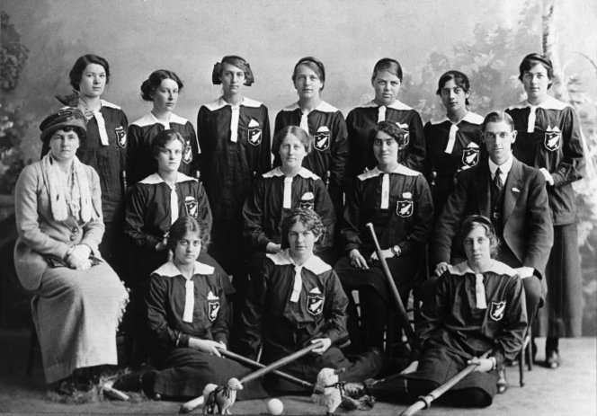 New Zealand Ladies' Hockey team that played England - Photographer unidentified. Making New Zealand :Negatives and prints from the Making New Zealand Centennial collection. Ref: MNZ-1000-1/4-F. Alexander Turnbull Library, Wellington, New Zealand. http://natlib.govt.nz/records/22910272