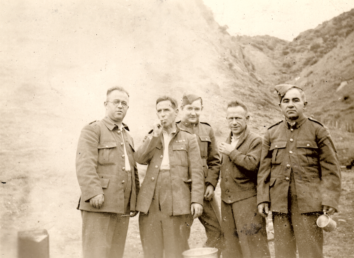 An overexposed photo of the cooks of C Company, Makara Battalion, New Zealand Home Guard, at Makara, 1942. They are L to R, Bryce, Casper, Kelly, Stewart and Cher(?). Lemuel Lyes Collection.
